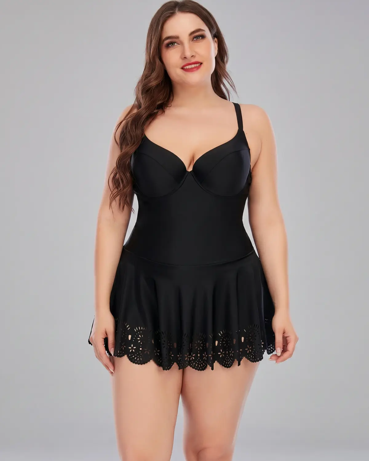 Woman in black lace swimsuit, smiling