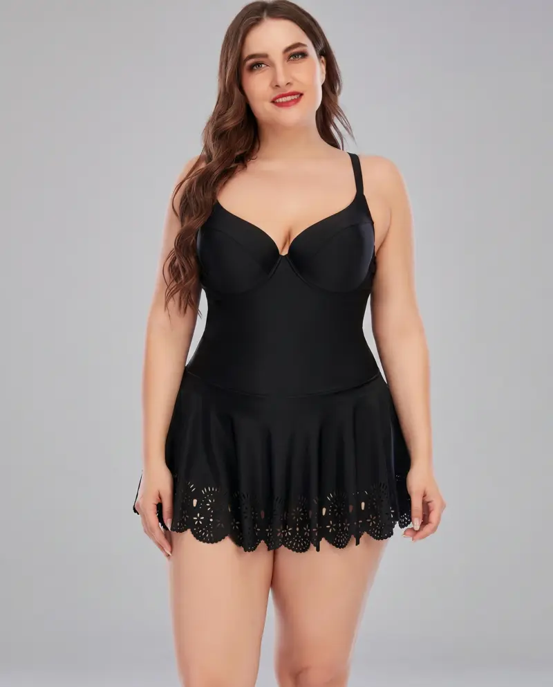 Woman in black lace swimsuit, smiling